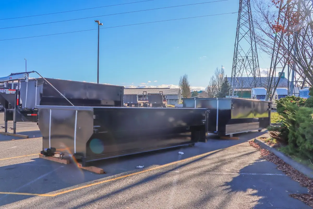 Roll-off dumpster ready for waste disposal at job site for 12 Yard Dumpster Rental in Manchester